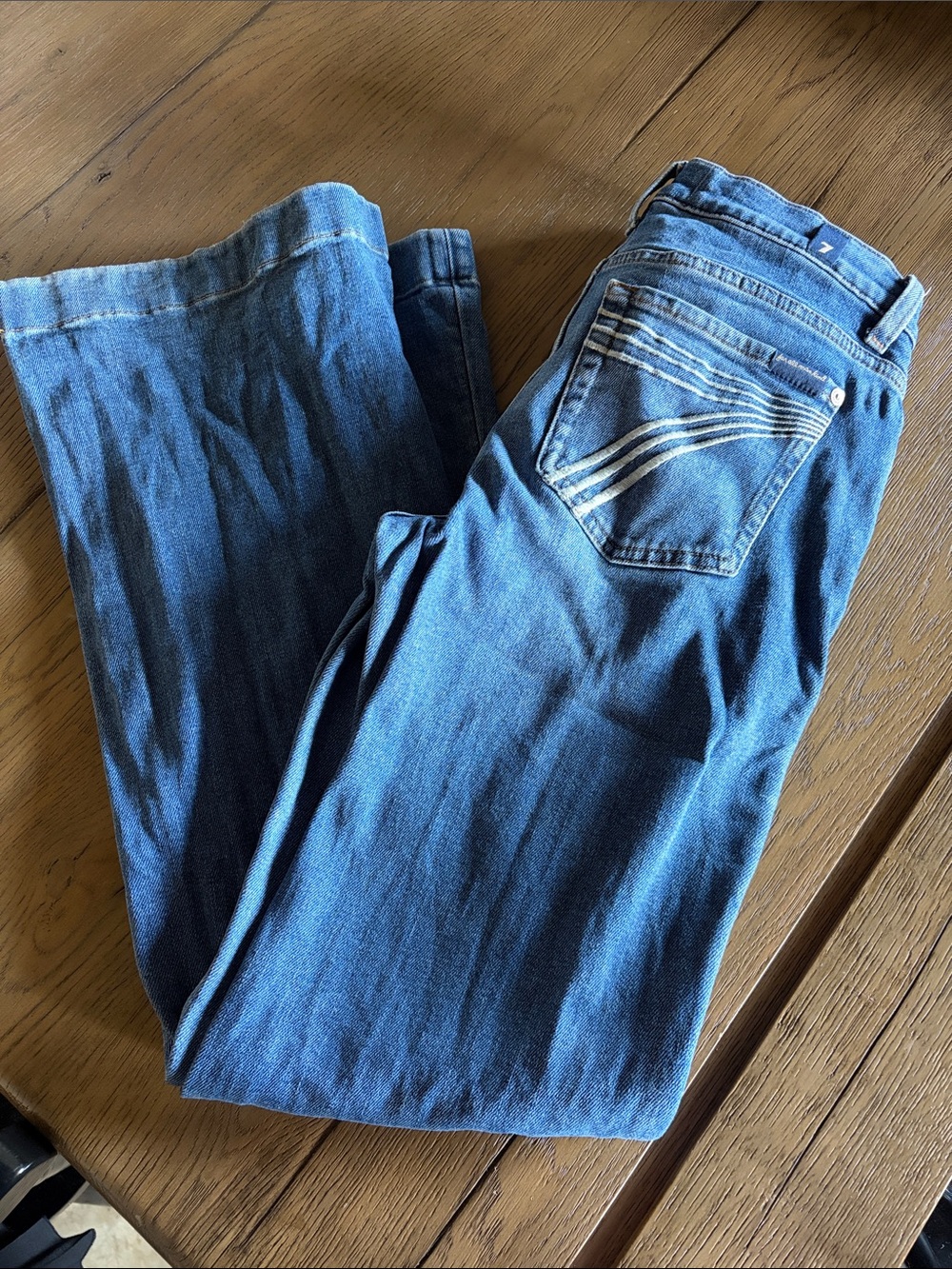 7 For All Mankind Women’s Blue Boot Cut Jeans with Signature Pocket Stitch